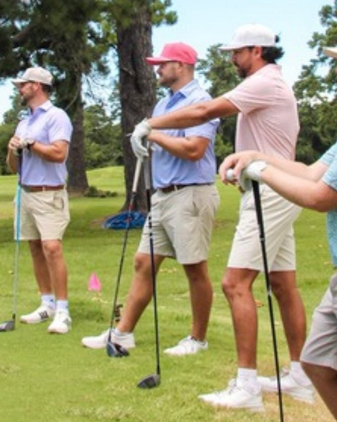 Jack Apparel men's golf polos - four golfers on the course