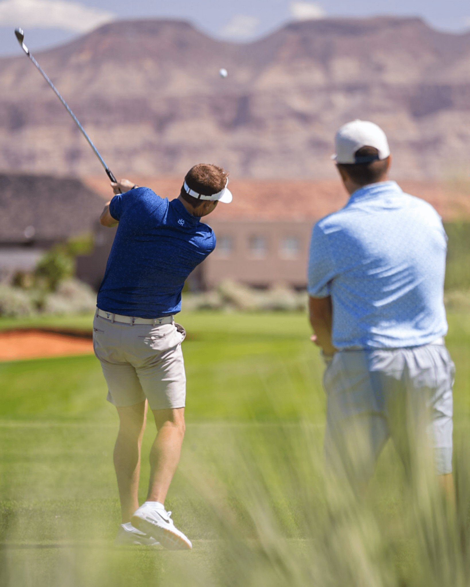 Close-up of Cowboy Caddie Blue polo collar and moisture-wicking performance fabric by Jack Apparel